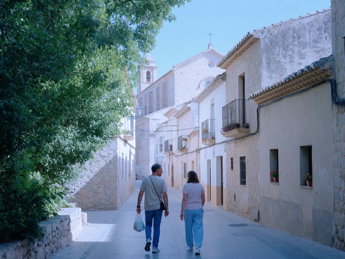 A couple in the stone-built old town of Benissa inland on the Costa Blanca